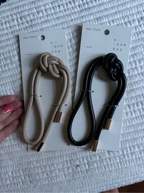 a new day Beige and Black Knot Bag Charms with Gold-Tone Caps